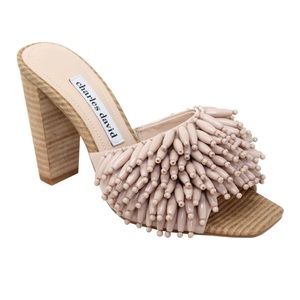 Authentic Charles David mule slides with leather upper and beaded fringe.